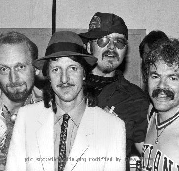 Doobie Brothers 9/11/82; Backstage at the Greek Theater in Berkeley, California. Left to right Michael Hossack, Patrick Simmons, John Hartman, Tom Johnston.