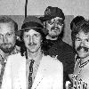 Doobie Brothers 9/11/82; Backstage at the Greek Theater in Berkeley, California. Left to right Michael Hossack, Patrick Simmons, John Hartman, Tom Johnston.