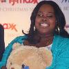 Glee cast-member Amber Riley (Mercedes) loves her teddy-bear at a charity appearance in Bryant Park in conjunction with the Marine Corps Toys for Tots program.