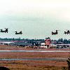 View of four Chinook helicopters over airfield at Ft. Lewis.