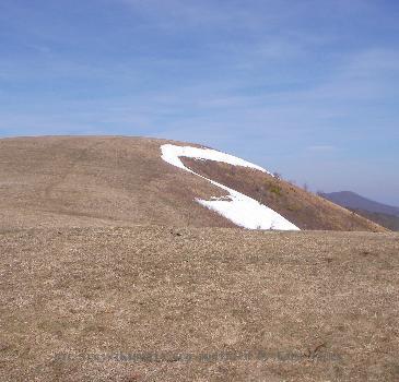 The Appalachian Trail crosses the grassy bald area atop Max Patch Mountain, a 4,616-ft (1,407m) summit in the Bald Mountains of the U.S. states of North Carolina and Tennessee.