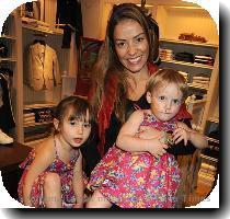 Smiling through the pain  Elen Rives with daughters Luna  left  and Isla at Ralph Lauren in Chelsea yesterday