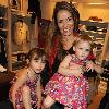 Smiling through the pain  Elen Rives with daughters Luna  left  and Isla at Ralph Lauren in Chelsea yesterday