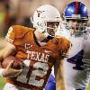 <p>Texas quarterback Colt McCoy  left  runs the ball past Kansas  Jeff Wheeler in the second half of an NCAA college football game  Saturday  Nov  21  2009  in Austin  Texas  In the 51 20 Texas win  McCoy earned his NCAA record 43rd career victory as a starter  < p>