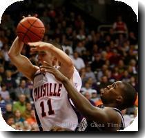 Evansville guard Colt Ryan left is fouled by Butler guard Shelvin