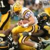 Defensive MVP  In his final year  he collected 55 tackles  41 solos  as he led the Big Ten and ranked 11th in the nation with 11 sacks  This is a photograph of Jonathan Babineaux in action  Photo Credit  CHUCK MYERS  Click for larger picture  How tall is Jonathan Babineaux  6 feet 2 inches