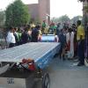 The solar taxi at the Sanskriti School Louis Palmer and Nobel prize winner