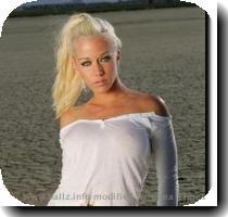 Kendra Wilkerson who is one of Hugh Hefners girlfriends and the star of E  s Girls Next Door was apparently treated like crap by Eminem on the set of his new video  Smack That Ass   Eminem s