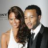 John Legend and his pretty girlfriend hit up the Sony BMG after party on the red carpet  But then again so did a lot of the celebs like Natalie Cole  Beyonce of course  Jigga man  Chaka Kahn