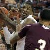 <p>Texas  Dexter Pittman fights for room in the paint against Texas State during an NCAA college basketball game in Austin  Texas  on Saturday  Dec  12  2009  Texas won 87 54  < p>