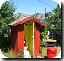 You have got to have your satellite TV  These people even have a satellite on their outdoor toilet  It probably runs to the house but it is still a funny picture  Tags