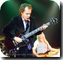 Angus Young Signature SG For over 25 years  the scorching riffs of Angus Young have driven the anthems of AC DC up the charts and around the world  Gibson s new Angus Young Signature SG is a faithful reproduction