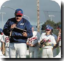 system and the players  who range from promising prospects in their late teens to those who have had a number of years in the big leagues  are paid professionals  Left  Coach Ken  Shorty  Ames presents the All American Invitational MVP award to catcher Brandon Marcelli Making it to the  Show  Although it is a long way