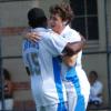 Freshman Dakota Collins celebrates his first goal with Amobi Okugo