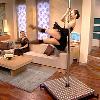 GMTV show host Lorraine Kelly had a shock when three models in stripper costumes demonstrated pole dancing to sell tights The dancers lifted their legs high in the air to show the hosiery GMTV show host Lorraine Kelly had a shock when three models in stripper costumes demonstrated pole dancing to sell tights The dancers lifted their legs high in the air to show the hosiery