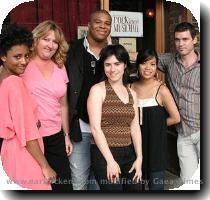 August 27 Oh Say Can You SESAC  Here s a picture from my SESAC Writer s on the Storm showcase gig at Rockwood Music Hall last month  The other writers on the storm  Rebecca Hart  Michael Lynche and Susan Cagle  are pictured with me  I m the one in the pink dress  The storm is not in the picture because me and the other