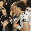 <p>New Orleans Saints quarterback Drew Brees  9  talks to his wife Brittany and son Baylen after the NFL Super Bowl XLIV football game against the Indianapolis Colts in Miami  Sunday  Feb  7  2010  The Saints won 31 17  < p>