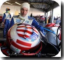 <p>Driver Max Papis  of Italy  prepares to put on his helmet in the garage during practice for the Rolex 24 hour auto race at the Daytona International Speedway in Daytona Beach  Fla   Thursday  Jan  28  2010 < p>