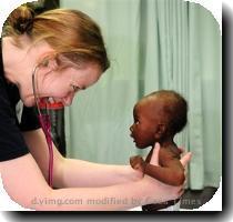 <p>In this Thursday  Jan  21  2010 photo  Lt  Jerri Gram  from Huntsville  Ala   a doctor aboard the Military Sealift Command hospital ship USNS Comfort  T AH 20   shares a smile with a female infant during an examination off the coast of Port au Prince  Haiti The infant was accompanied by her mother and was treated by Comfort medical staff for dehydration  < p>