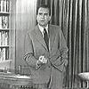 1952  about 40 percent of the nation s homes had television sets and about 80 percent had radios  It would be one of the first political uses of television to appeal directly to the populace  Nixon standing in his studio made office during his Sept 1952  Checkers  speech  In the speech  Nixon sat a desk  with his wife Pat nearby  seated in a parlor chair  The camera focused