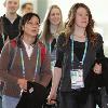 <p>Speedskater Clara Hughes  right  of Winnipeg  Man   and Kristina Groves  centre rear  of Ottawa  Ont   walk with national team coach Xiuli Wang  left  as they arrive at Vancouver International Airport in Richmond  Britsh Columbia  Canada for the Vancouver Winter Olympics on Friday  Feb  5  2010  < p>