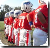 football  One of these guys made a hard tackle to the other team s quarterback much to the amusement of the fans and to the chagrin of the coaches  Did I mention they were 5 7 year olds