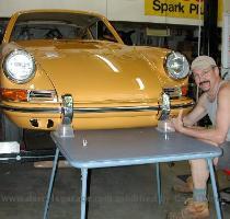 I was able to easily position the heavy and ackward sized bumper by myself  The stable work surface made it possible to attach the assembly without a single new paint defect being created  While it looks all finished  today s effort was only a test fitting so I can mark the positions and tighten the bolts on the bumper brackets that cannot be accessed with the bumper