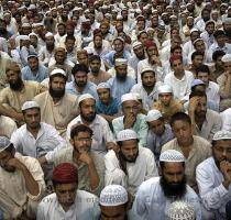 CBC News Men listen to the speech of their clerics next to Islamabad s radical Lal Masjid  or Red Mosque  in Islamabad on Sunday   Emilio Morenatti Associated Press At least 15 people died and 36