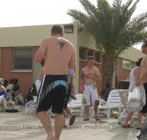 half the soldiers have tattoos  some of which cover large parts of their bodies  I think these are very unattractive  and a big waste of time and money  Quite a few soldiers disagree  They play music  and have cold drinks standing by  It s a chance to see people in a different environment  without their Army Combat Uniforms or even PT clothes  just beach wear  It s a