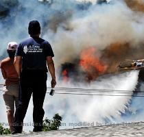 The Daily Bulletin reports a brush fire that began in Phillips Ranch Friday about 11 a m  was 50 percent contained at press time last night  Brush clearance intended to prevent fires