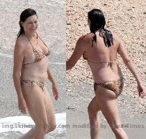 Morticia Addams     err  Anjelica Huston went to the beach  And she s looking great for 57  I like that she s confident enough to wear a tiny bikini on the beach   even more  a sexy animal