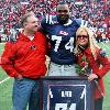 by Michael Lewis  Oher s story will become familiar to the general public  The movie  which stars Sandra Bullock and Tim McGraw as Leigh Ann and Sean Tuohy  opens around Thanksgiving  Family photo Sean and Leigh Anne Tuohy and their adopted son  Ole Miss lineman Michael Oher  are the focus of the movie  The Blind Side   starring Sandra Bullock