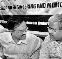 DISTINGUISHED PANEL  The Registrar of the NTR University of Health Sciences  P  Jayakar Babu  having a word with R  Sambasiva Rao  head