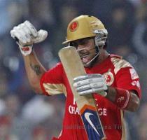 Royal Challengers Bangalore s Virat Kohli  celebrates after beating Chennai Super Kings during their IPL semi final match in Johannesburg on Saturday   AP Photo