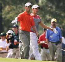<p>Mike Weir  left  of Canada chats with Camilo Villegas of Colombia as they walk down the 15th fairway during a practice round at the Masters golf tournament in Augusta  Ga   Wednesday  April 7  2010  The tournament begins Thursday  April  8  < p>