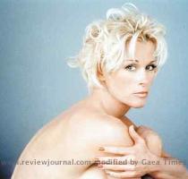 Lorrie Morgan says the publicity photo for her  Naked Truth  tour protests country music s discrimination against its veterans   My age demands respect   says the singer  part of a National