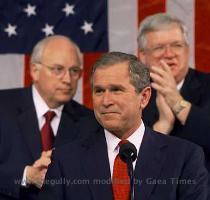 President George W  Bush is applauded by Vice President Dick Cheney  L  and the joyful House Speaker Dennis Hastert  joint session of Congress  Washington February 27  2001  Doug Mills