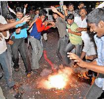 Photo  K R  Deepak ON CLOUD NINE  Students of a private college firing crackers soon after the Intermediate results were declared in Visakhapatnam on Monday