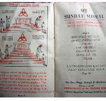 I mentioned a while back the missal my dad gave me  I thought I d post some pics  I don t own a scanner  these were taken with my camera  Click to see larger versions  As you can see by the creases  this dear little book has been around for a while  It is still in pretty good shape  overall  though  If you want to see a really good image of the left hand