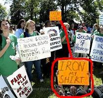 Imagine what would happen to the guy if the protesters turned around and saw that It s been photoshopped    original was bad  but not that bad  http   throwinthetowel files wordpre   st protest jpg