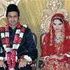 <p>India  tennis player Sania Mirza  R  and Pakistani cricketer Shoaib Malik smile during their wedding ceremony at a hotel in the southern Indian city of Hyderabad April 12  2010  < p>