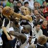 Caron Butler and Gilbert Arenas help up Andray Blatche after a foul  Toni L  Sandys The Washington Post San Antonio Spurs guard George Hill steals a rebound from Wizards forward Antawn Jamison  Toni L  Sandys The Washington Post