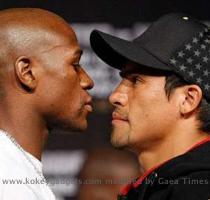 Laptops Notebooks   Photo of Floyd Mayweather Jr and Juan Manuel Marquez of Mexico during the weigh in for their match on September 19  2009