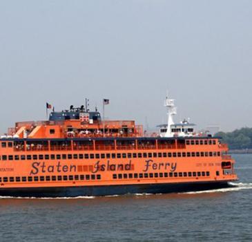 to Staten Island  Sit on the top right side of the boat to get the best pictures of the Statue of Liberty  At the back of the boat  you ll also get a nice view of the Manhattan Skyline