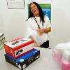 Kmart layaway clerk Tita Sabangan shares a laugh with a customer  The company will run a holidays ad campaign about its layaway service   Rick Loomis Los Angeles Times