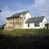 Above  The screened porch in our 1860s mansard roofed Wellfleet house  Above  Two views of the screened porches at the