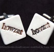 Cuff links individually handcrafted in porcelain  Each reads howzat  Ideal gift for your special cricket lover