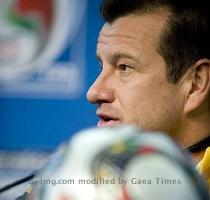 Dunga   Photo Dunga   Wednesday June 24  06 09 PM Brazil s national soccer team s coach   seen here addressing a press conference in Johannesburg  said his team should not be over confident about