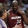 Miami Heat s Shaquille O Neal  32  talks with official Steve Jarvie during play against the Chicago Bulls in the third quarter of game two of the NBA Eastern Conference quarterfinals in