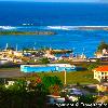 I had a chance to do some sightseeing in the village of Hagatna  and while at Fort Santa Agueda I took some great photos overlooking Hagatna  In the left image you can see the village of